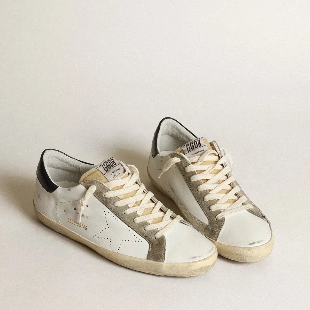 Golden Goose Super-Star Sneaker With Perforated Star And Blue Heel Tab Golden Goose Super-Star Sneaker With Perforated Star And Blue Heel Tab