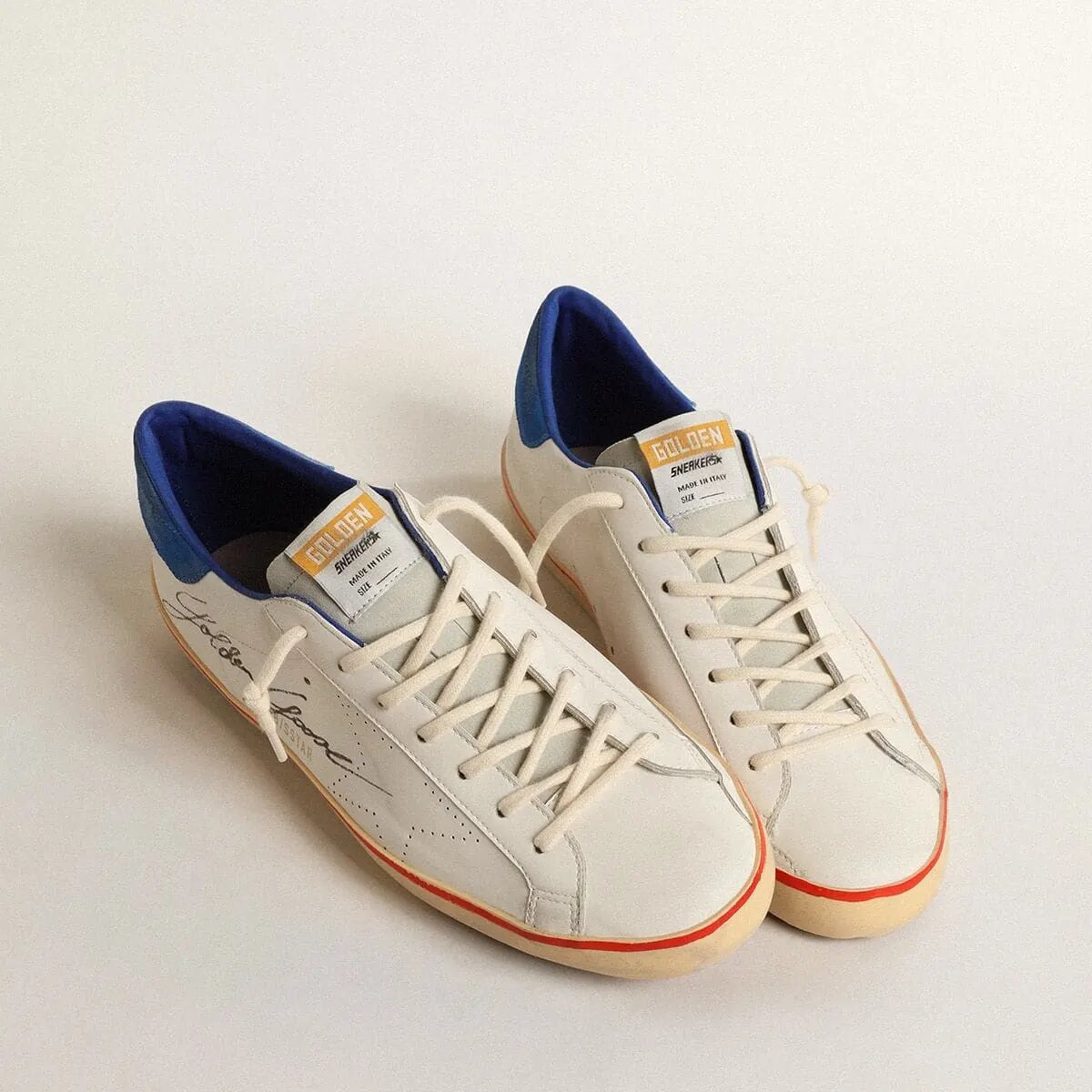 Golden Goose Super-Star Sneaker With Perforated Star And Blue Suede Heel Tab Golden Goose Super-Star Sneaker With Perforated Star And Blue Suede Heel Tab