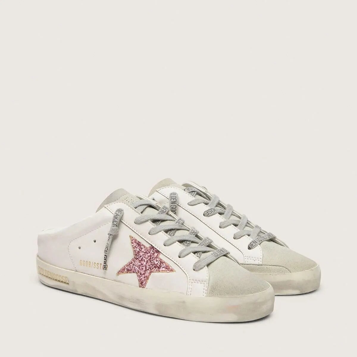 Golden Goose Bio-Based Super-Star Sabot Sneaker With Pink Glitter Star And Suede Toe Golden Goose Bio-Based Super-Star Sabot Sneaker With Pink Glitter Star And Suede Toe
