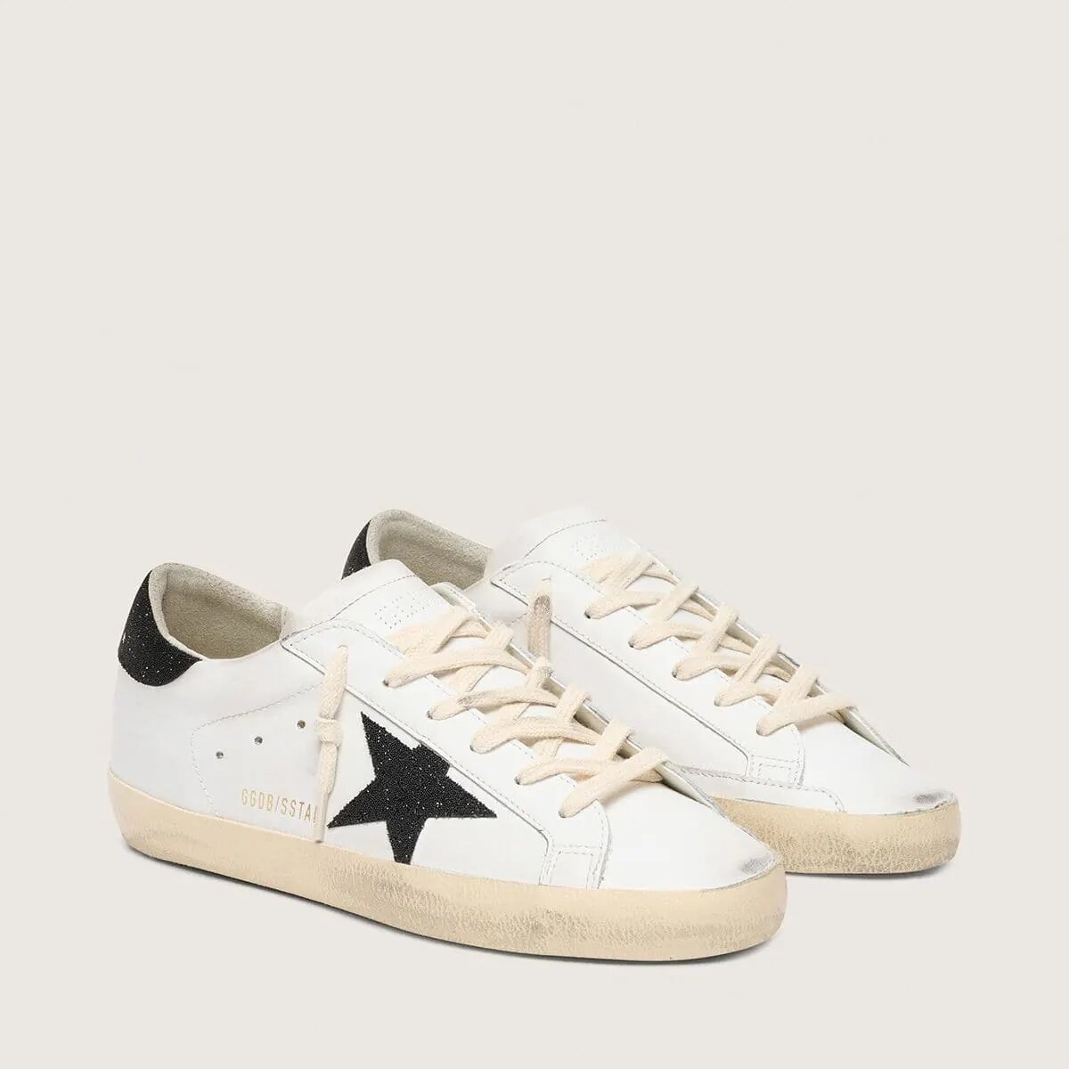 Golden Goose Super-Star Sneaker With A Black Swarovski Crystal Star And Heel Tab Golden Goose Super-Star Sneaker With A Black Swarovski Crystal Star And Heel Tab