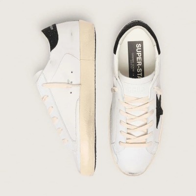 Golden Goose Super-Star Sneaker With A Black Swarovski Crystal Star And Heel Tab Golden Goose Super-Star Sneaker With A Black Swarovski Crystal Star And Heel Tab