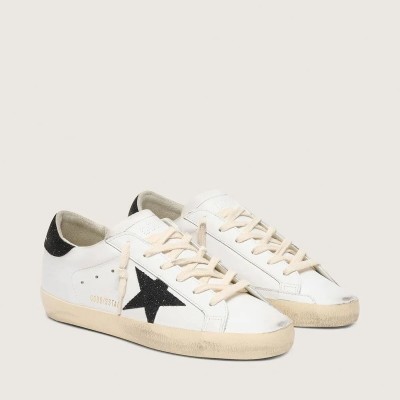 Golden Goose Super-Star Sneaker With A Black Swarovski Crystal Star And Heel Tab Golden Goose Super-Star Sneaker With A Black Swarovski Crystal Star And Heel Tab