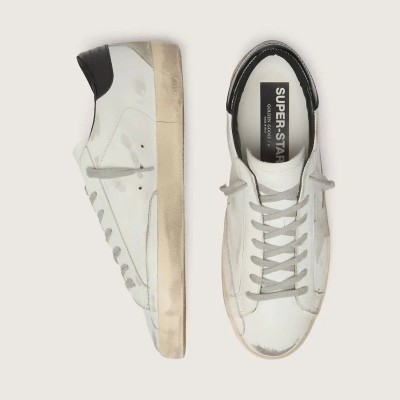 Golden Goose Super-Star Sneaker With Black Heel Tab And Metal Stud Lettering Golden Goose Super-Star Sneaker With Black Heel Tab And Metal Stud Lettering