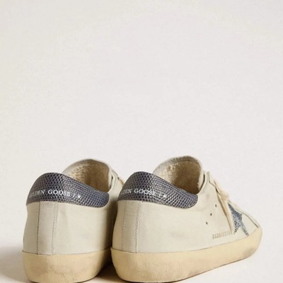 Golden Goose Super-Star Sneaker With Cream-Colored Leather Star Sneaker With Swarovski Crystals And Blue Leather Heel Tab With Lizard Print Golden Goose Super-Star Sneaker With Cream-Colored Leather Star Sneaker With Swarovski Crystals And Blue Leather Heel Tab With Lizard Print