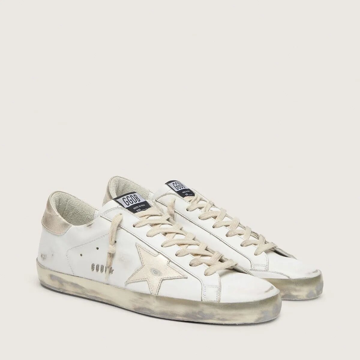 Golden Goose Super-Star Sneaker With Gold Sparkle Foxing And Metal Stud Lettering Golden Goose Super-Star Sneaker With Gold Sparkle Foxing And Metal Stud Lettering