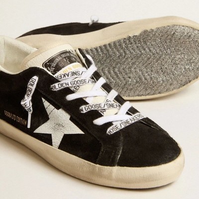 Golden Goose Super-Star Ltd Sneaker In Black Suede With White Printed Star And Silver Glitter Heel Tab Golden Goose Super-Star Ltd Sneaker In Black Suede With White Printed Star And Silver Glitter Heel Tab