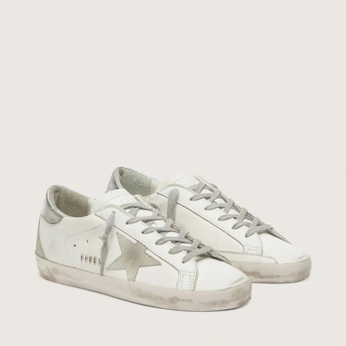 Golden Goose Super-Star Sneaker With Silver Heel Tab And Metal Stud Lettering Golden Goose Super-Star Sneaker With Silver Heel Tab And Metal Stud Lettering