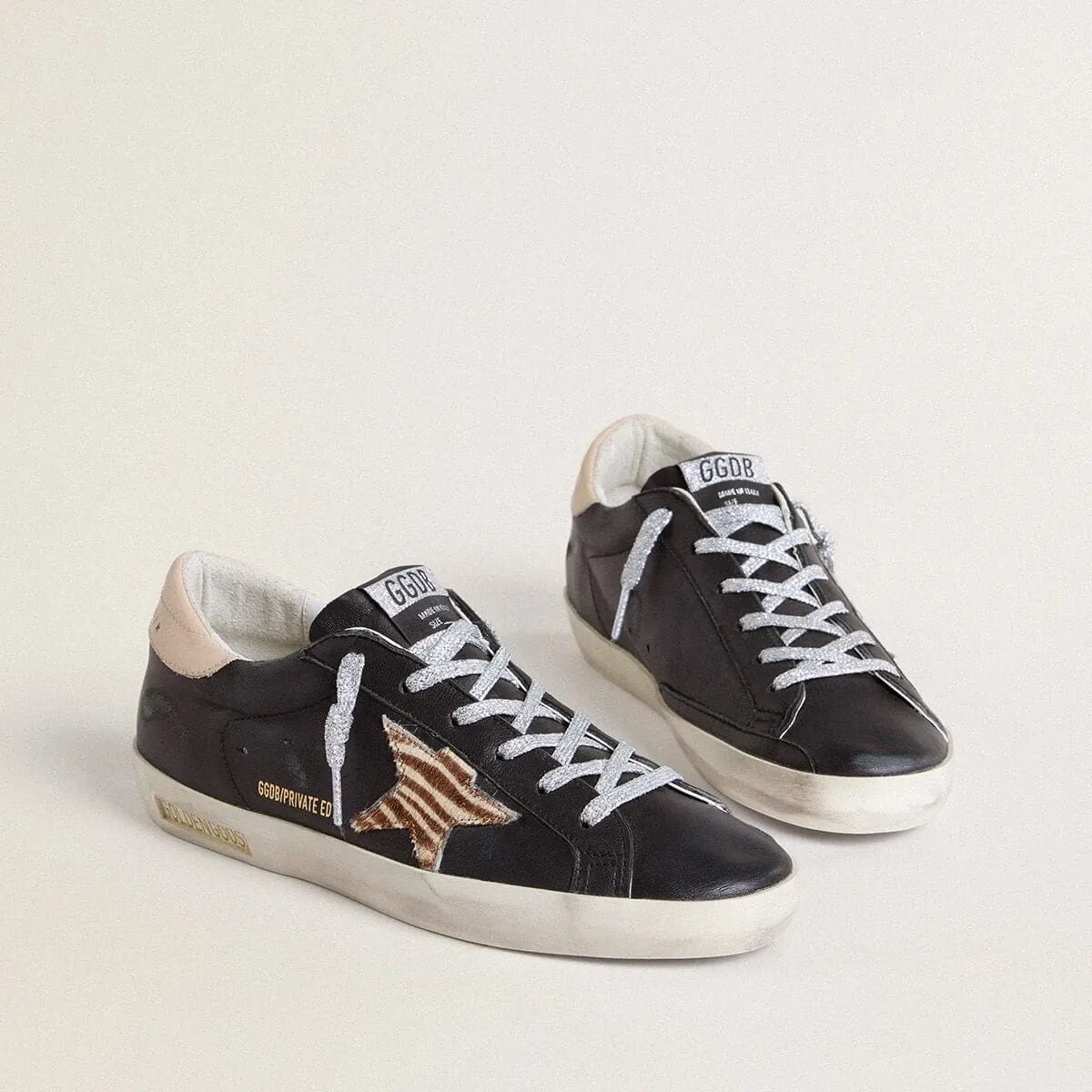 Golden Goose Super-Star Sneaker In Black Nappa Leather With Zebra-Print Pony Skin Star And Beige Leather Heel Tab Golden Goose Super-Star Sneaker In Black Nappa Leather With Zebra-Print Pony Skin Star And Beige Leather Heel Tab