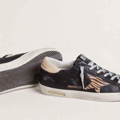 Golden Goose Super-Star Sneaker In Black Nappa Leather With Zebra-Print Pony Skin Star And Beige Leather Heel Tab Golden Goose Super-Star Sneaker In Black Nappa Leather With Zebra-Print Pony Skin Star And Beige Leather Heel Tab