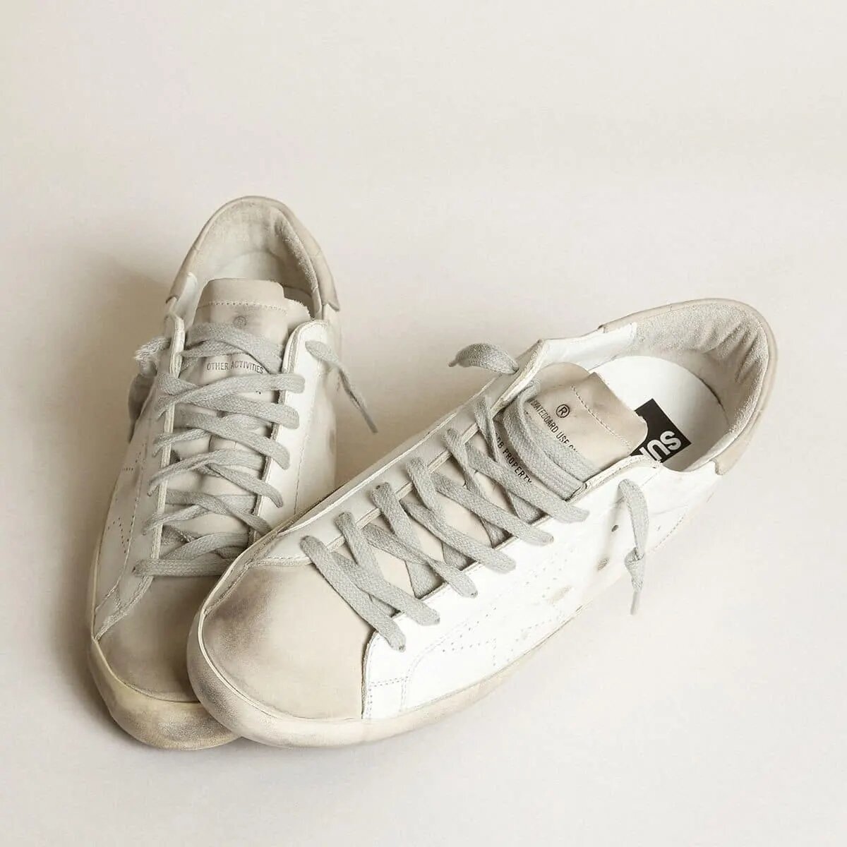 Golden Goose Super-Star Sneaker In White Leather With Perforated Star And Beige Nubuck Heel Tab Golden Goose Super-Star Sneaker In White Leather With Perforated Star And Beige Nubuck Heel Tab